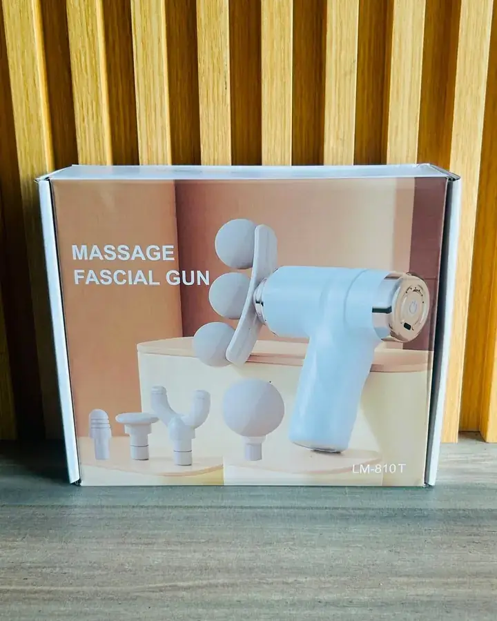 Caja de la pistola de masaje facial con sus cabezales